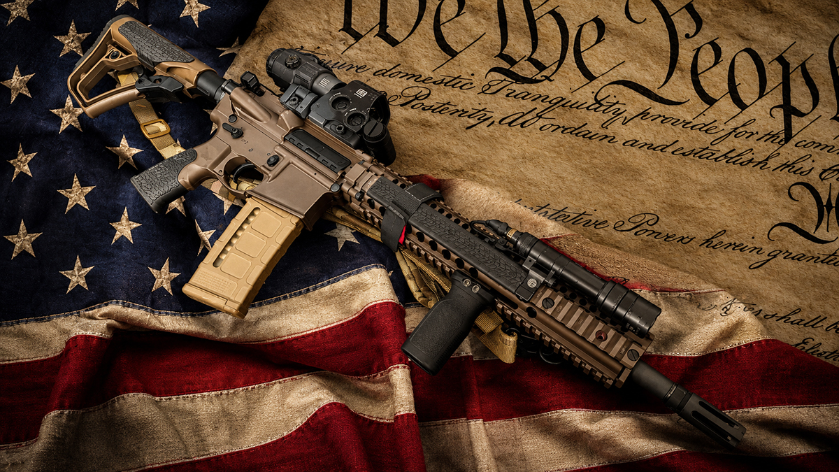 American flag, Constitution, and firearm silhouette representing America 250 and the Second Amendment