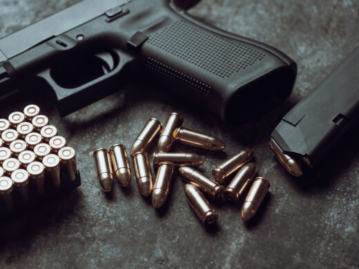 Jack Harrington argues that school officials searched his truck without reasonable suspicion or voluntary consent after learning he lawfully possessed a handgun away from campus. The search found no firearm. iStock-1445552933