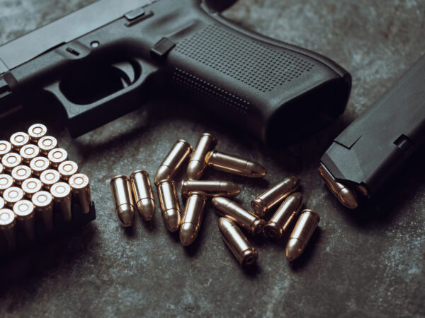 Jack Harrington argues that school officials searched his truck without reasonable suspicion or voluntary consent after learning he lawfully possessed a handgun away from campus. The search found no firearm. iStock-1445552933
